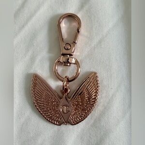 Charlotte Tilbury Rose Gold Winged Keychain